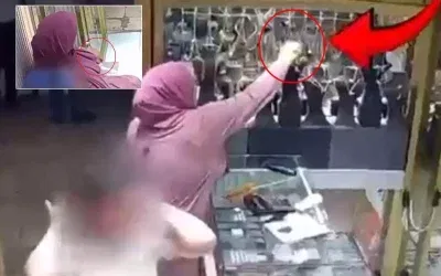 Cesaretine hayran kaldım! Göz göre göre vitrinden çaldı.