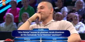 Altın Palmiye sahibi yönetmen, hangi film festivalinde “En İyi Yönetmen” seçildi?